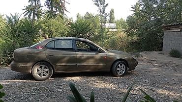 mtz 82 1: Daewoo Leganza: 1997 г., 1.6 л, Механика, Бензин, Седан — 1