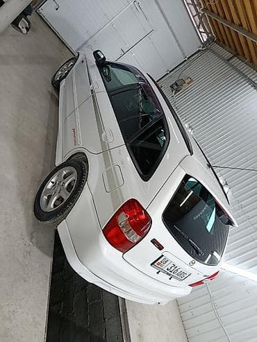 mar x: Mazda Familia: 2001 г., 2 л, Автомат, Бензин, Хэтчбэк — 5