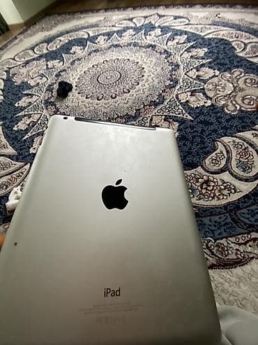 Ноутбуки: Apple iPad (черный фронт, серебристая задняя крышка) с 9.7" дисплеем и — 2