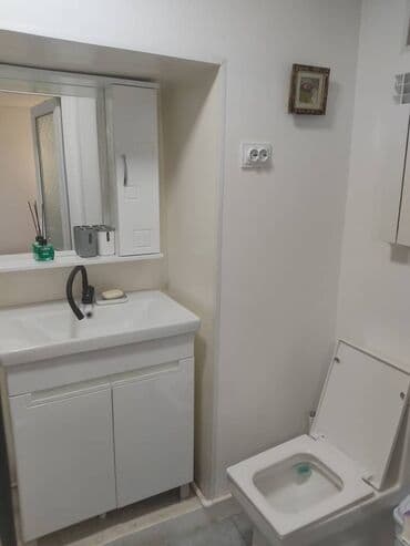 купить 4 комнатную квартиру в бишкеке: Уютная студия с отдельным входом - Спальная зона: двуспальная кровать — 5