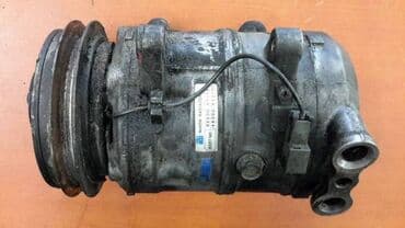 ремонт автомобильных кондиционеров: Компрессор Nissan Оригинал — 1