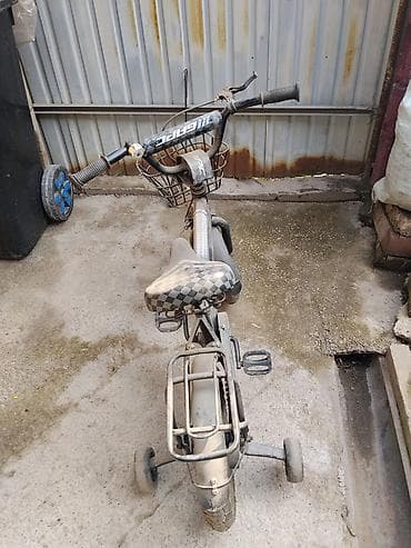 Городские велосипеды: Детский велосипед с дополнительными боковыми колесами. Характеристики — 2