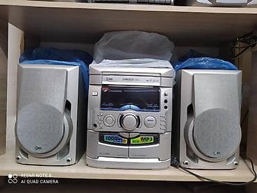 Продаю недорого LG музыкальный центр есть AUX есть и другие муз