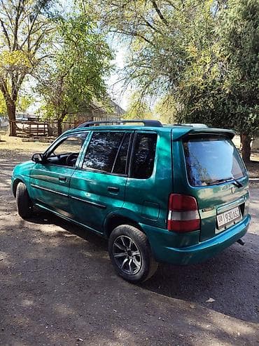 Транспорт: Mazda Demio: 1999 г., 1.3 л, Механика, Бензин, Хэтчбэк — 3