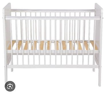 Детская кроватка-колыбель классического типа. - Материал: массив
