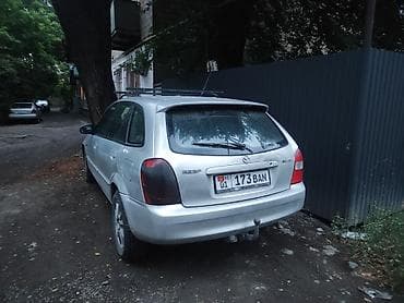 e2 byd: Mazda 323: 2002 г., 2 л, Автомат, Бензин, Хэтчбэк — 3