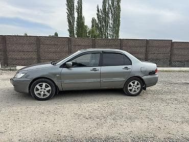 аудио усилитель: Mitsubishi Lancer: 2006 г., 1.6 л, Механика, Бензин, Седан — 2
