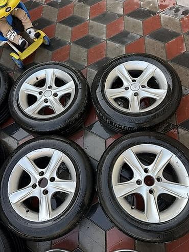 e53 4 8: Колеса в сборе 185 / 65 / R 15, Комплект, Литые, отверстий - 4 — 1