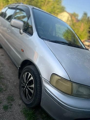 подлокотник аутбек: Honda Odyssey: 1998 г., 2.3 л, Автомат, Бензин — 1