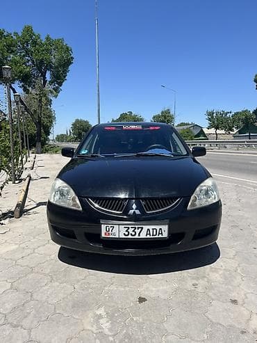 byd leopard 5: Mitsubishi Lancer: 2003 г., 1.6 л, Автомат, Бензин, Универсал — 1