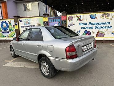 mg zr: Mazda 323: 2003 г., 1.6 л, Механика, Бензин, Седан — 4