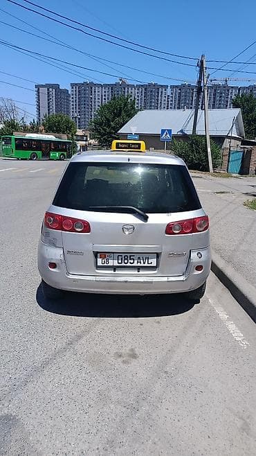 mini coper: Mazda Demio: 2006 г., 1.3 л, Автомат, Бензин, Хэтчбэк — 1