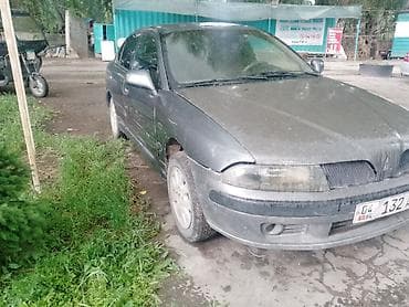 дом обмен на авто: Mitsubishi Carisma: 2003 г., 1.8 л, Механика, Бензин — 6