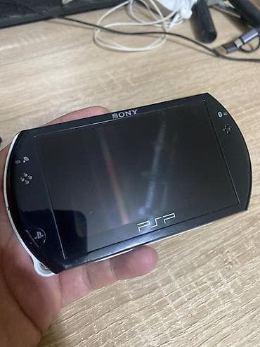 psp 5: Портативная консоль Sony PSP Go (PSP-N1000) - Форм‑фактор слайдер — 2