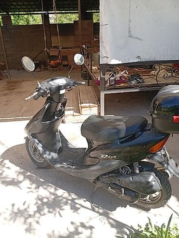 dio 27 af27: Скутер Honda Dio, черный цвет. Особенности и комплектация: - Легкий — 2