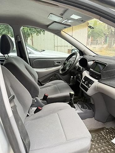 Nissan Tino: 2004 г., 1.8 л, Механика, Бензин, Минивэн — 2