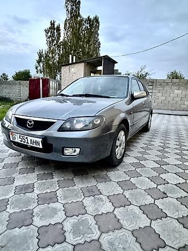 ресор масквич: Mazda 323: 2002 г., 1.6 л, Механика, Бензин, Хэтчбэк — 8