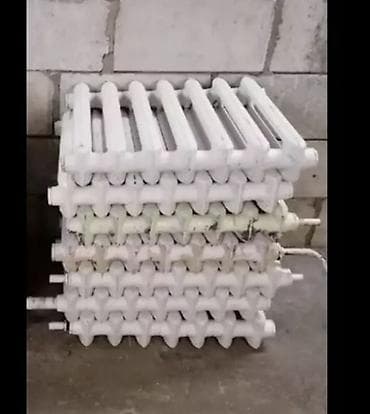 чугунные батерия: Чугунные радиаторы отопления (батареи), многосекционные. Описание: - — 1