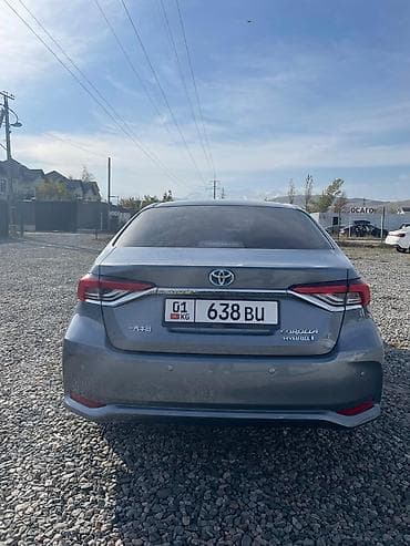 byd e3: Toyota Corolla: 2021 г., 1.8 л, Вариатор, Гибрид, Седан — 4