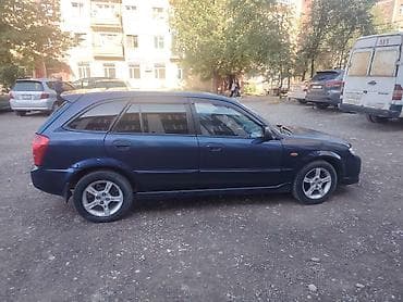 subaru forester 2001: Mazda 323: 2002 г., Механика, Хэтчбэк — 9