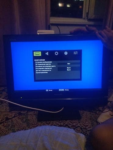 Телевизор Toshiba REGZA, диагональ ~24–26". Компактная модель на