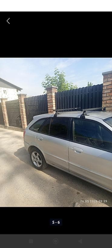 kirgiz auto: Mazda 323: 2002 г., 1.6 л, Механика, Бензин, Хэтчбэк — 3