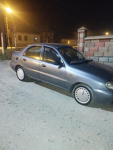 капот на ланос: Daewoo Lanos: 2006 г., Ручные, Бензин, Седан — 7