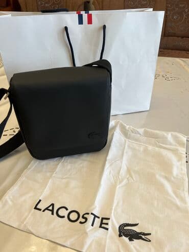 сумка и кошелек набор: Продаю барсетку Lacoste. ORIGINAL️ Цвет черный️ Брали за 20тыс. в — 5