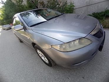 м рул: Mazda 6: 2005 г., 1.8 л, Кол менен иштөөчү, Бензин, Седан — 3