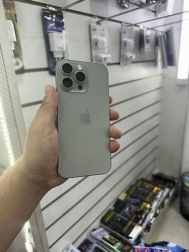 aifon 6: IPhone 15 Pro Max, 256 ГБ, White Titanium, 76 % — 1