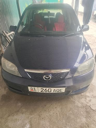 Mazda Demio: 2003 г., 1.3 л, Автомат, Бензин, Хетчбек — 1