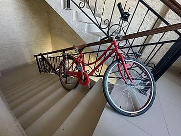 багажник на степ спада: Городской велосипед с низкой рамой (step-through), колесами 26", в — 1