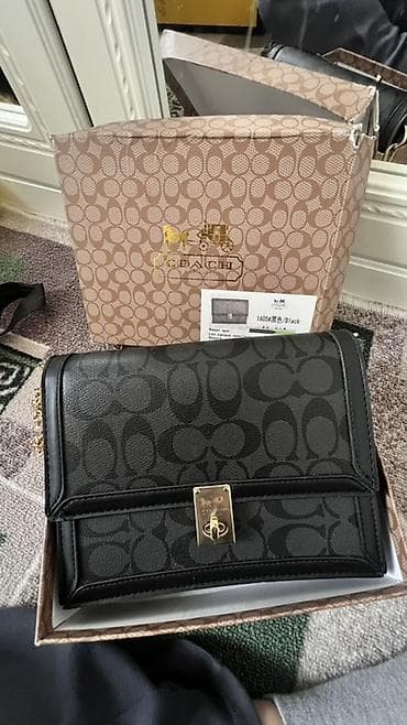 Барсетки: Сумка Coach, цвет Black, фирменный монограмный принт Signature C — 1