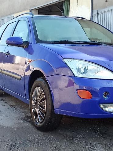 авто выхлоп: Ford Focus: 2000 г., Механика — 4