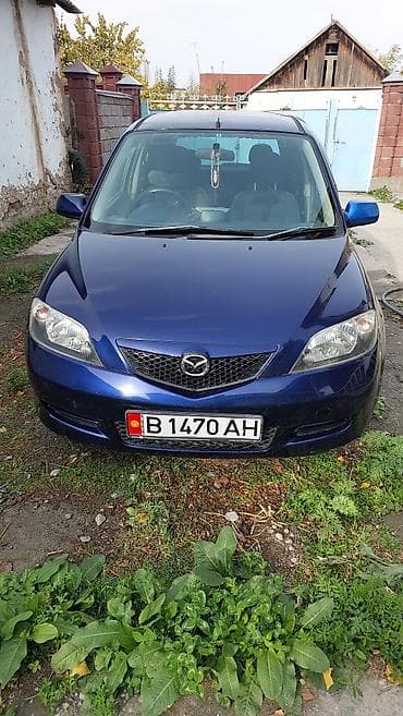 чехлы бу: Mazda Demio: 2004 г., Автомат, Бензин, Хэтчбэк — 6
