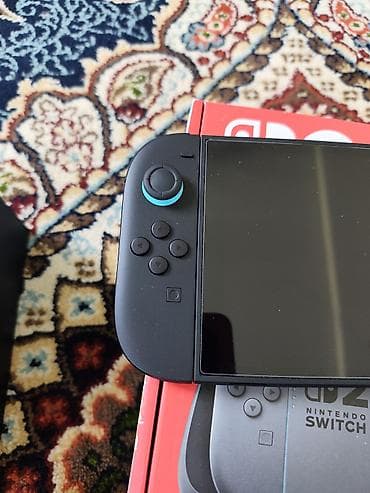 nintendo switch сколько стоит: Nintendo Switch 2 (модель OLED) — комплект для игры дома и в дороге — 3