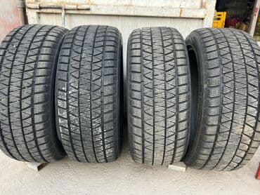 зимние шины на ниву 21214: Шины 265 / 45 / R 21, Зима, Комплект, Япония, Bridgestone — 7