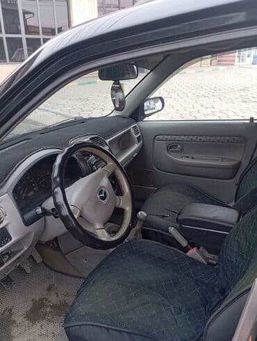 Ковролин: Mazda Demio: 2001 г., 1.5 л, Механика, Бензин, Хетчбек — 5