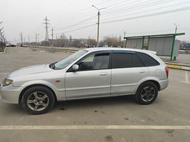 Ламинат: Mazda 323: 2002 г., 1.5 л, Автомат, Бензин, Универсал — 3