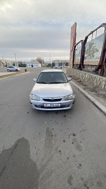 токмок продажа: Mazda 323: 1998 г. — 6