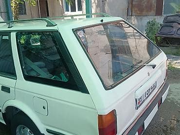 машина byd e2: Nissan Sunny: 1990 г., Бензин, Универсал — 4