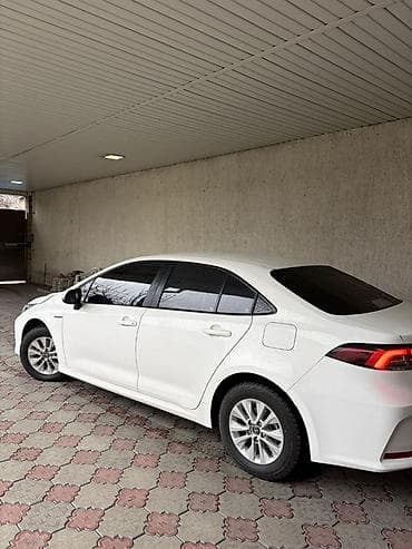crown 2018: Toyota Corolla: 2019 г., 1.8 л, Вариатор, Гибрид, Седан — 8