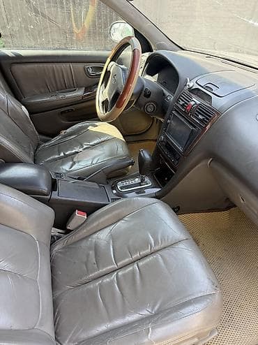 аламединское ущелье: Nissan Almera: 2002 г., 2 л, Автомат, Бензин — 5