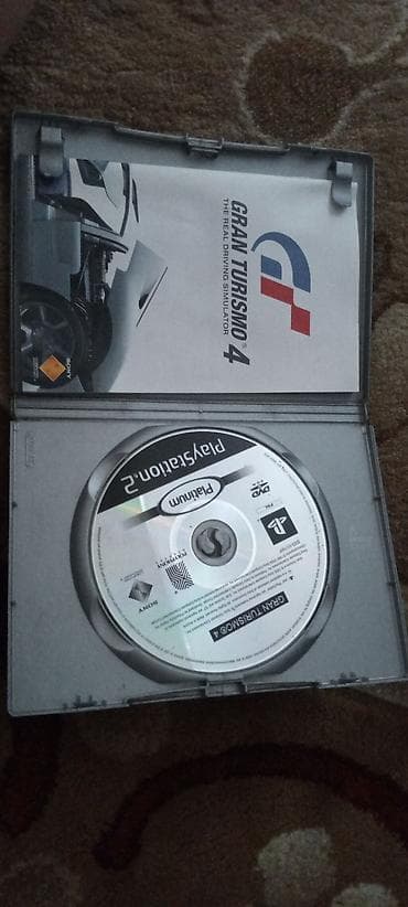 Видеоигры и приставки: Gran Turismo 4 (Platinum) — диск для PlayStation 2, регион PAL — 2