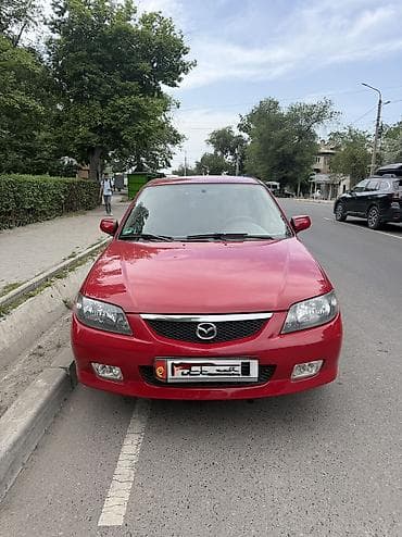 rx 7: Mazda 323: 2002 г., 1.6 л, Механика, Бензин, Хэтчбэк — 2