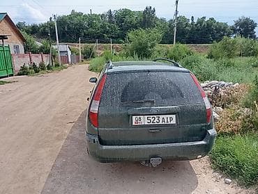 8: Ford Mondeo: 2003 г., 1.8 л, Механика, Газ, Универсал — 6