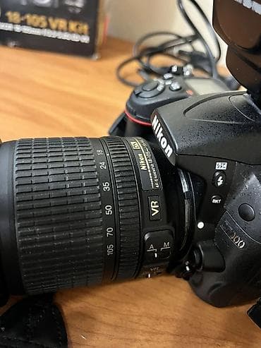 Фото жана видеокамералар: Зеркальная фотокамера Nikon D7000 с универсальным зум-объективом и — 3