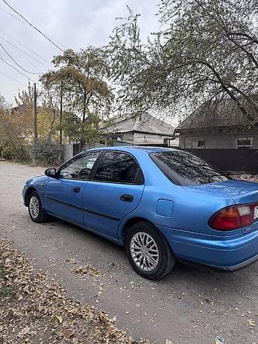 кузов маз: Mazda 323: 1999 г., 1.5 л, Ручные, Бензин, Седан — 4