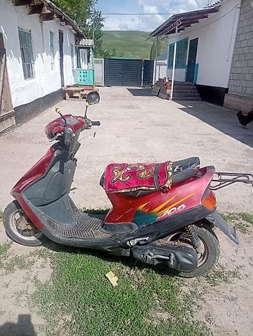 Мотоуслуги: Скутер Yamaha Jog, красный цвет. красный Основные характеристики:таза — 9