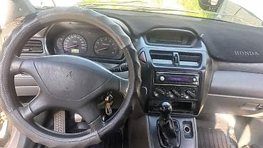 Mitsubishi Chariot: 1999 г., 2.4 л, Механика, Бензин, Минивэн — 1